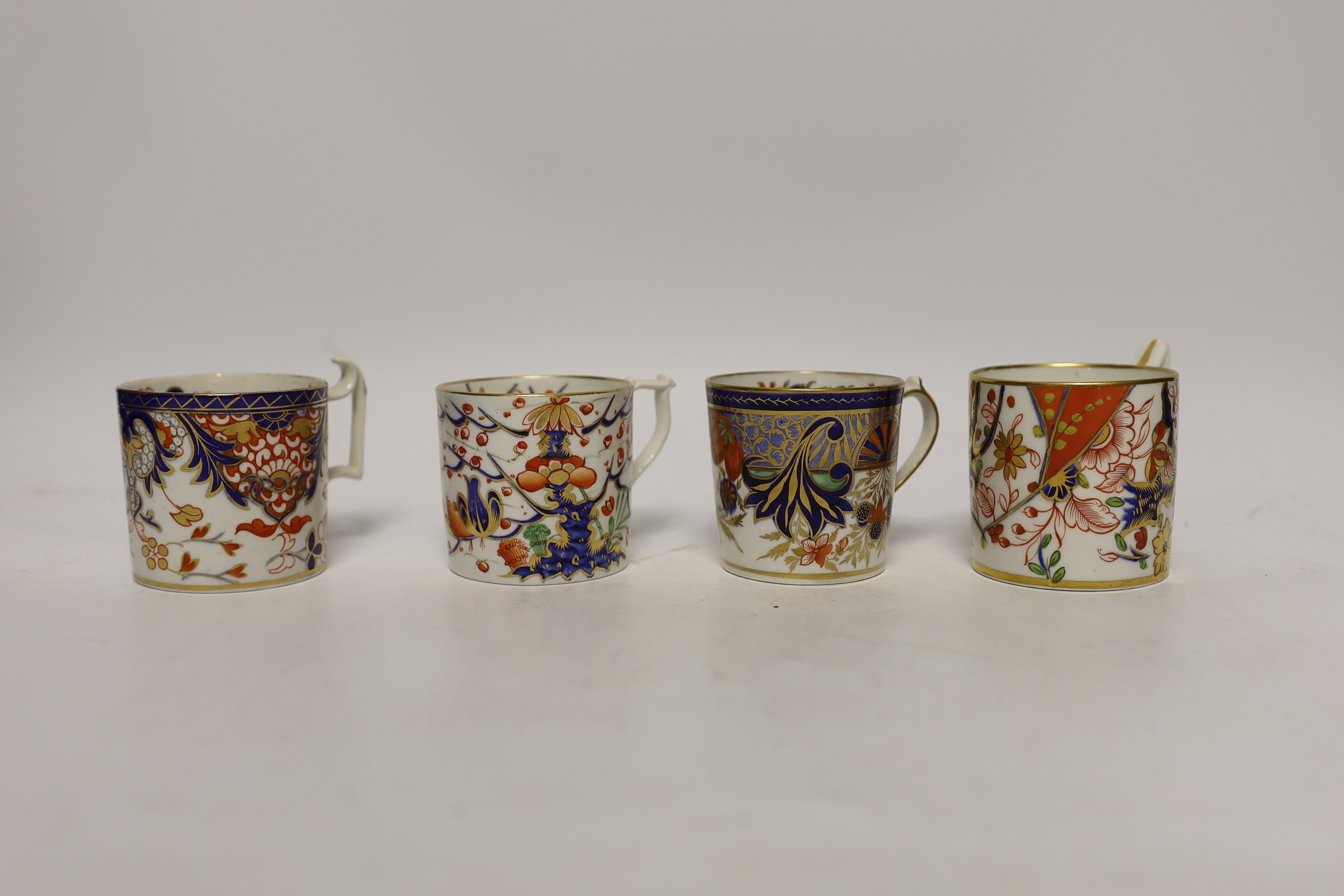 Twelve 1800-1820 English Imari patterned coffee cans